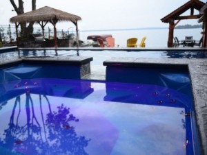 Spillover spa on a custom fiberglass pool in Innisfil ON